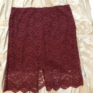 Wine color lace over skirt.